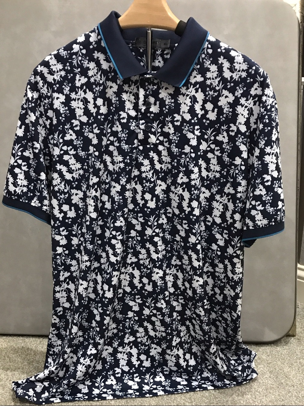 G/FORE Navy Polo with White Floral Print and Teal Trim